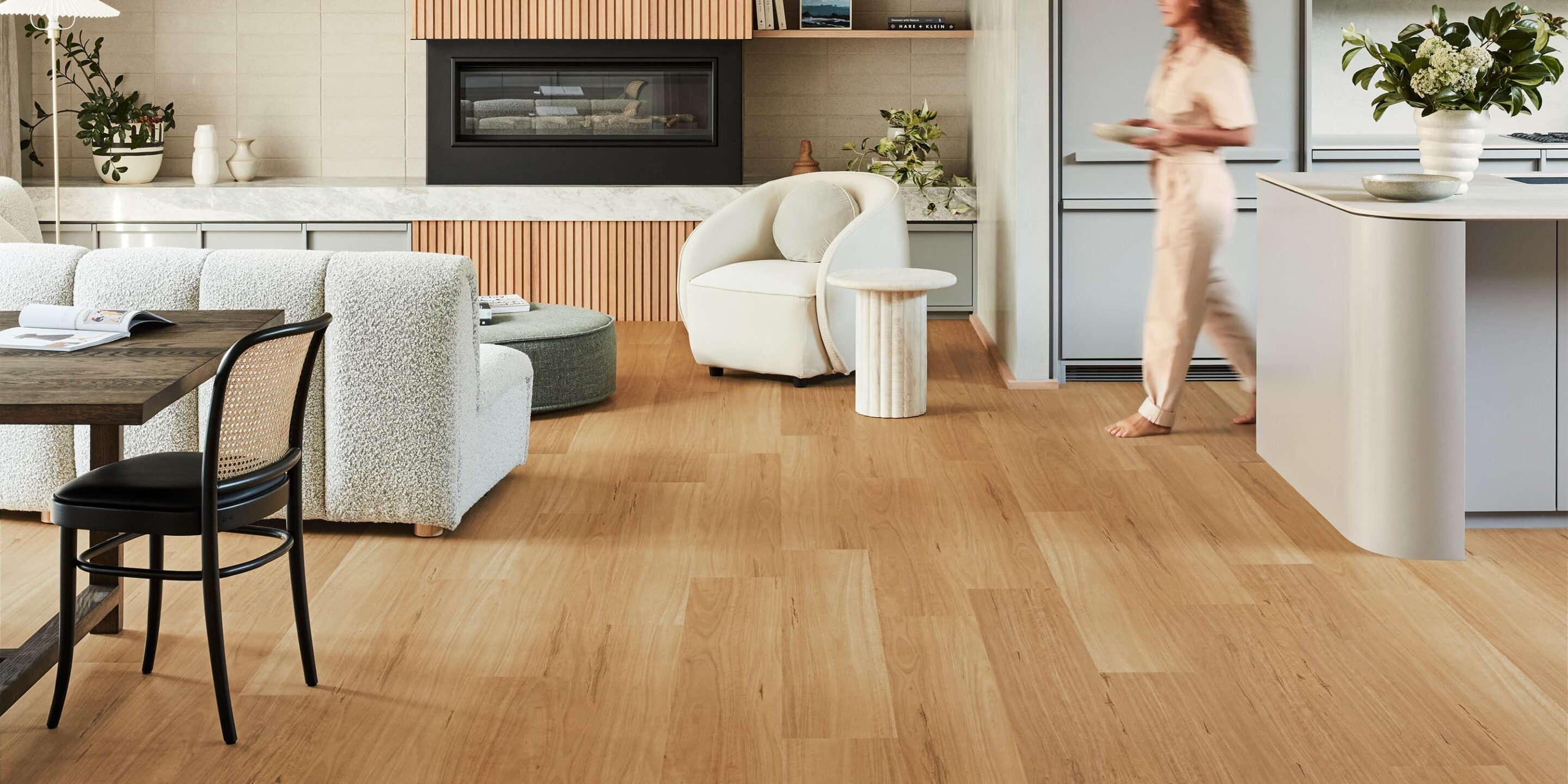 vinyl plank flooring over tiled kitchen and living area