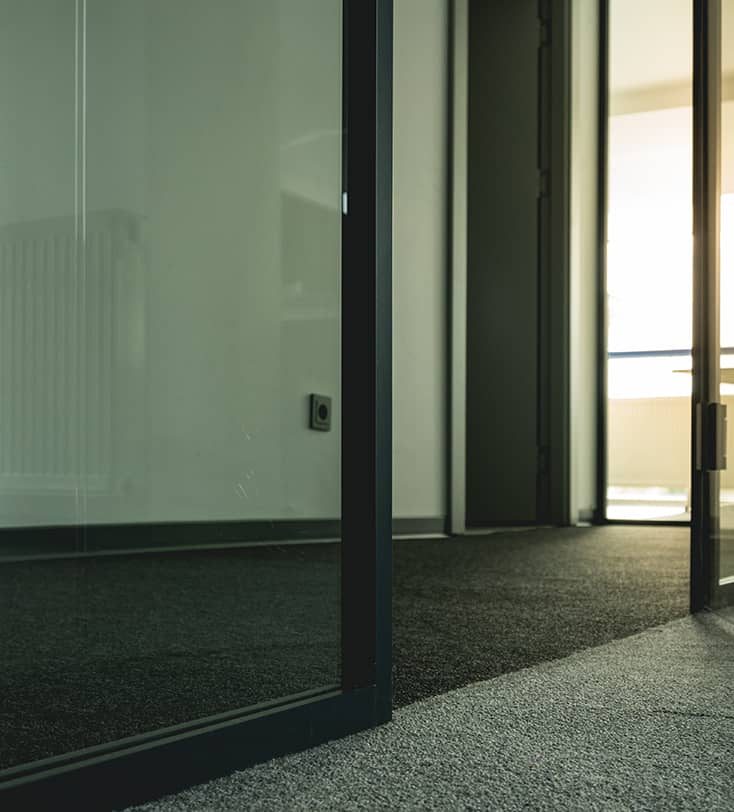 Glass door — Flooring Experts in Brisbane, QLD