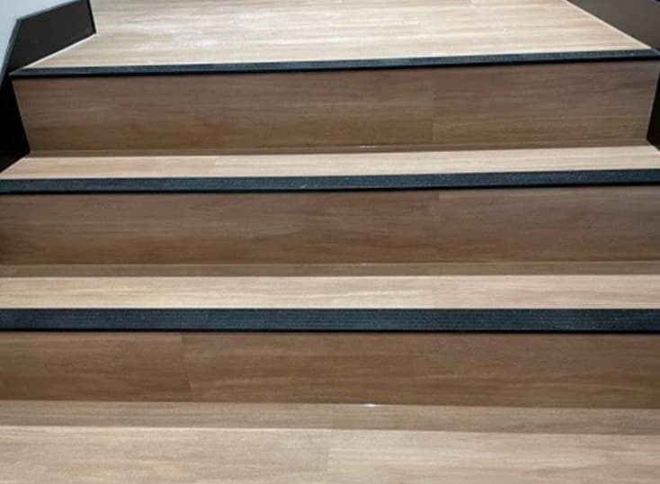 Wood stairs flooring — Flooring Experts in Brisbane, QLD